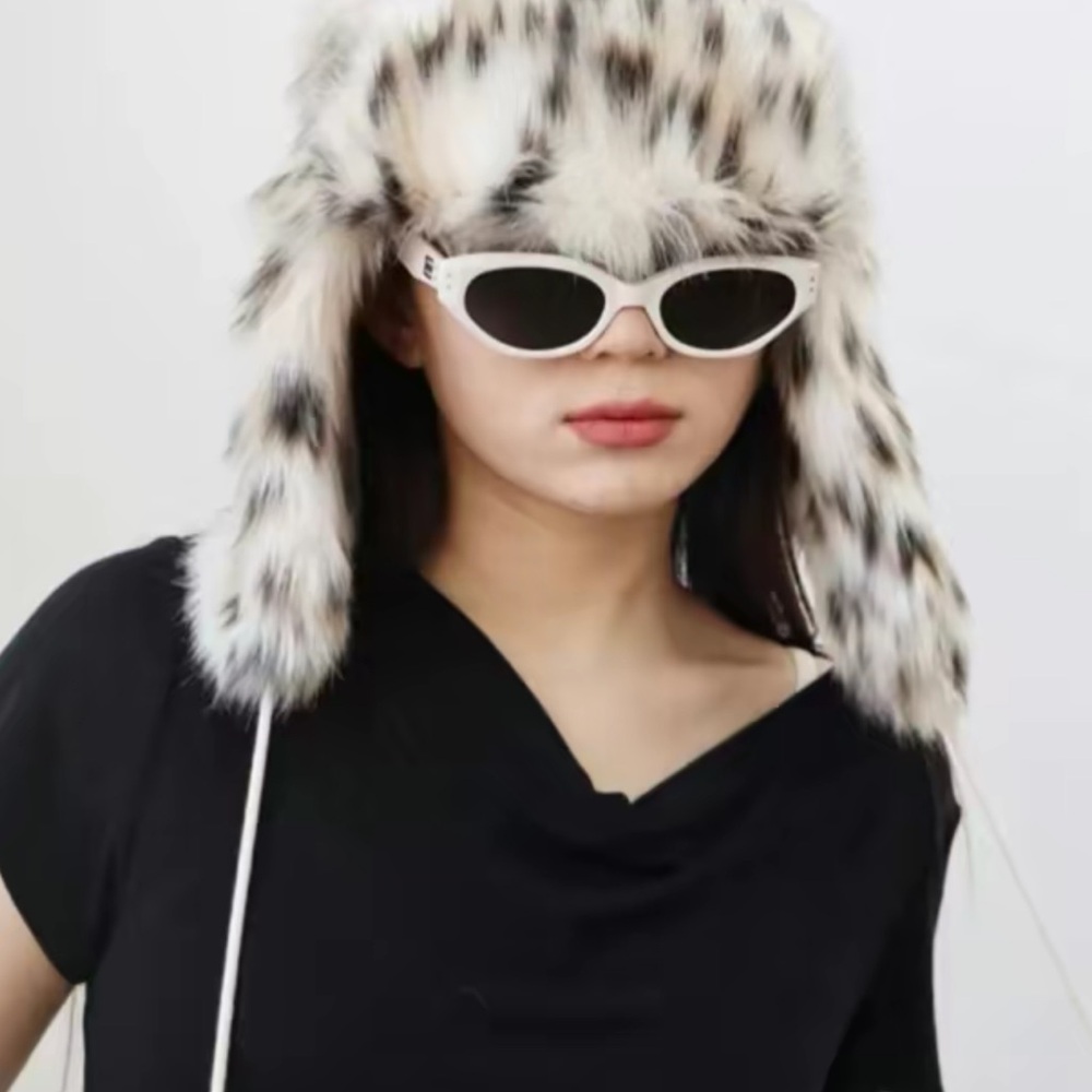 Elegant Faux Fur Trapper Hat in Black and White